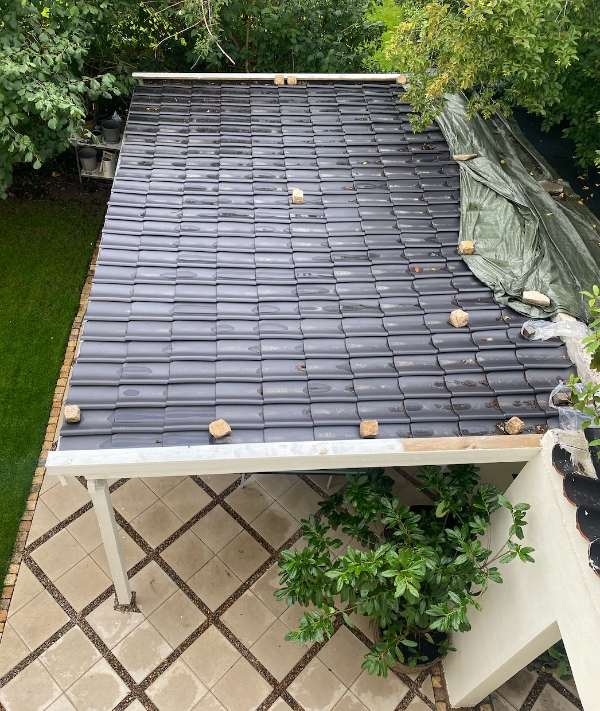 Tætning af tegltag på overdækning