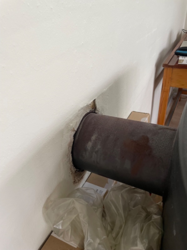 Bortskaffelse af brændeovn og tilmuring