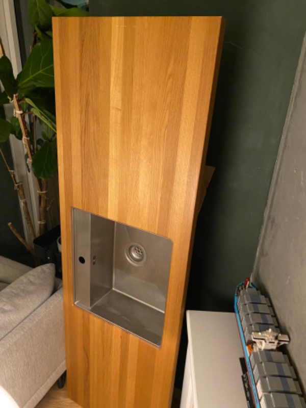 Montering af køkkenbordplade med underlimet vask