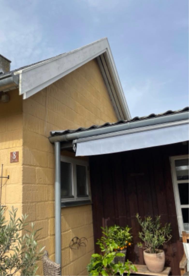 Maling af top afslutning på tag