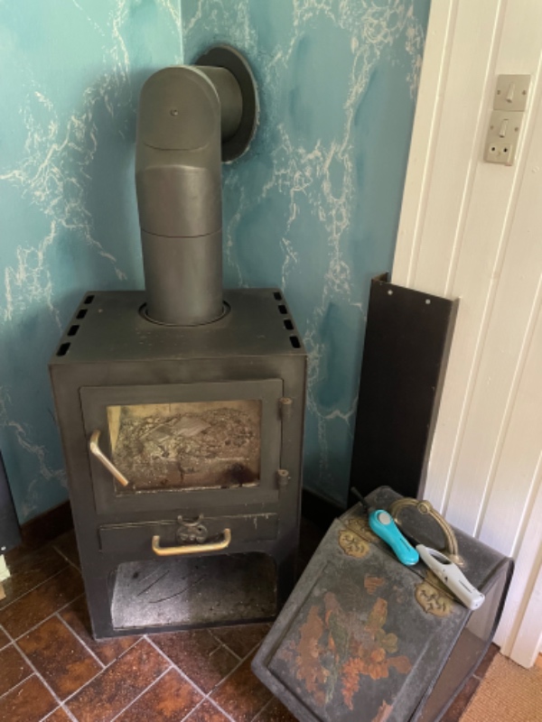 Nedtagning og opsætning af brændeovn