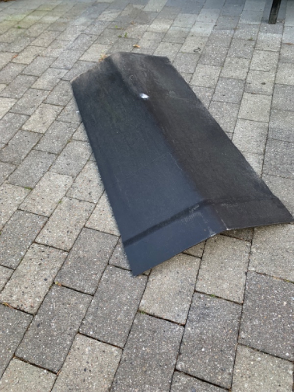 Udskifte en tagrygplade på taget