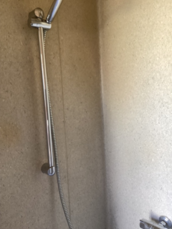 Skiftning af fuger i brusekabine