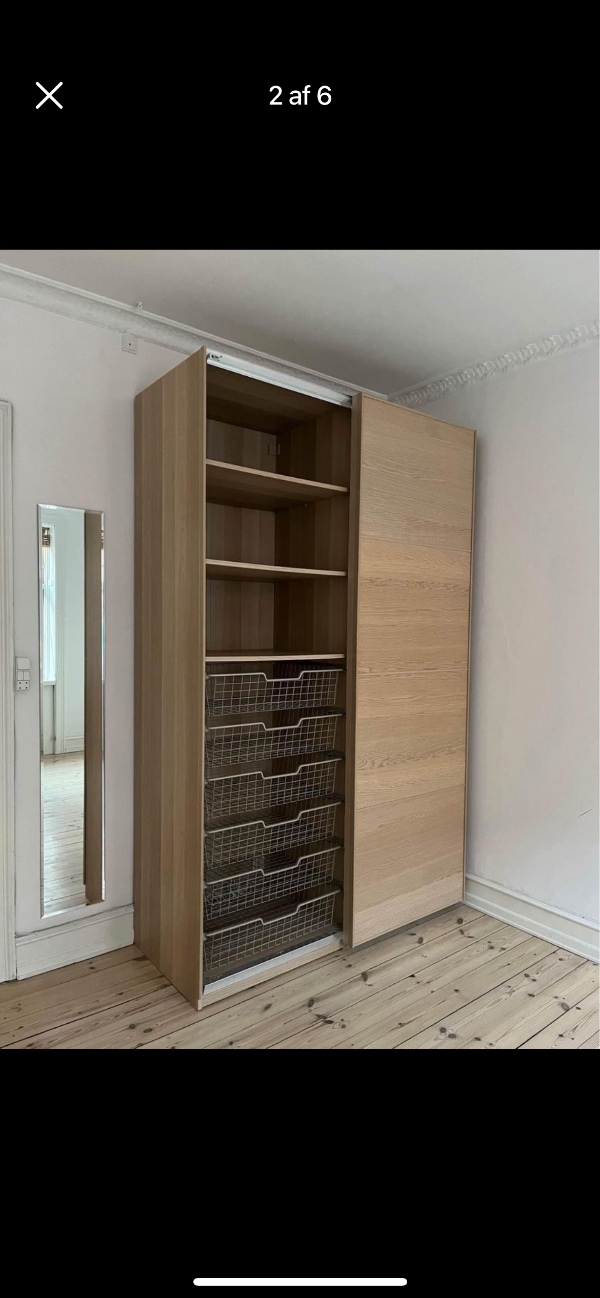 Hente et skab - skal bæres ned og køres fra en adresse til en anden. Vi bærer det selv op.