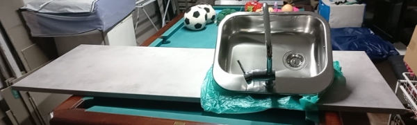 Tiles and setting up ikea plade/cupboard