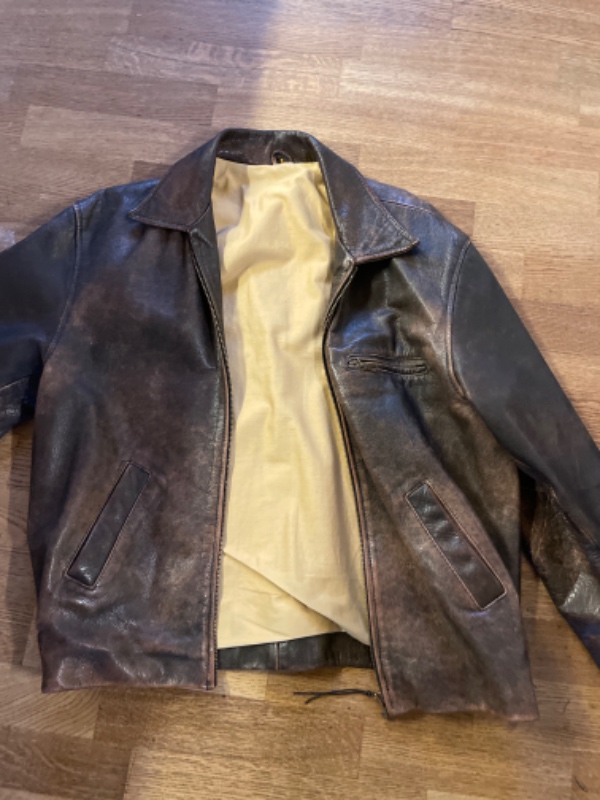 Udskiftning eller rep af lynlås i læderjakke ca 58cm