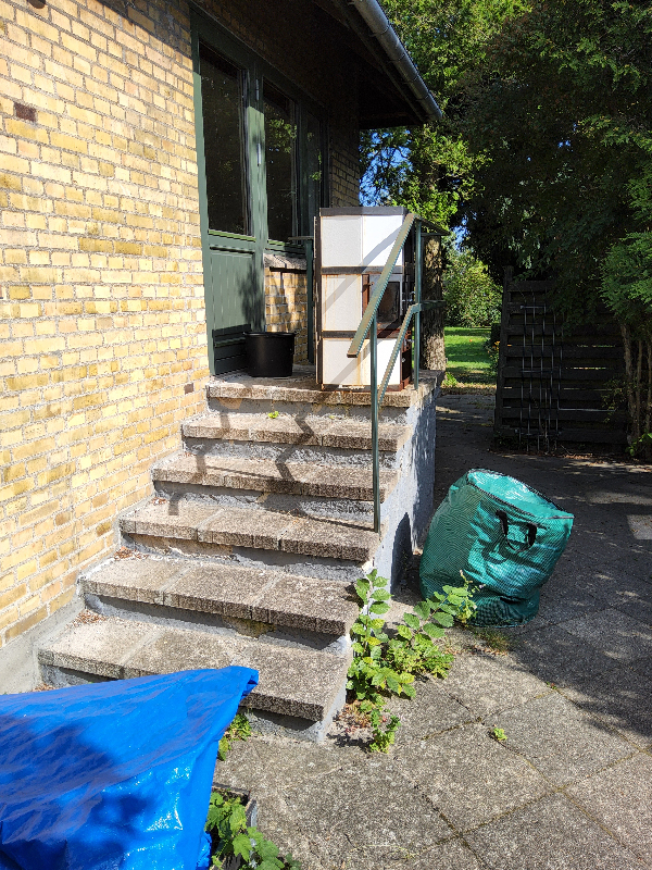 afhentning af gammel brændeovn